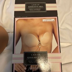 Lace up adhesive bra. New.